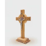 Natural grain detail of hand-carved crucifix showing authentic olive wood