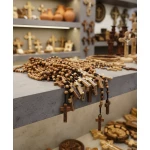 Detail of Bethlehem engraved wooden cross on olive wood rosary