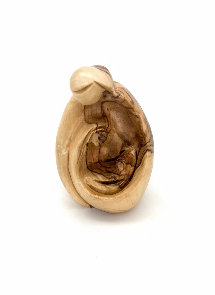 Hand-carved Mary baby Jesus figurine showing mother and child in olive wood Hand-carved Mary baby Jesus figurine showing mother and child in olive wood