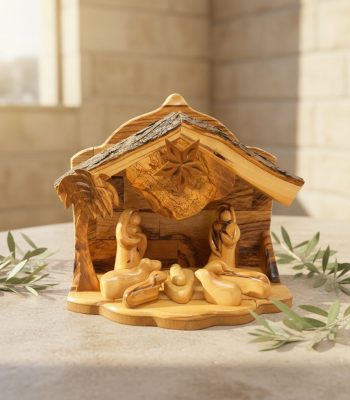 Hand-carved nativity figurines showing authentic wooden nativity scene detail