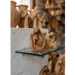 Mary baby Jesus figurine displayed as spiritual gift and bethlehem religious wood carving art