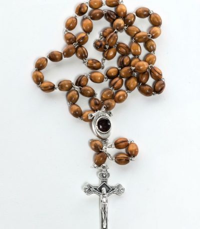 Olive wood metal rosary with polished oval beads and metal crucifix displayed on white background