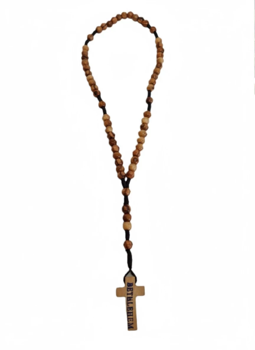 Olive wood rosary with Bethlehem cross displayed on white background